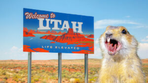 Utah Gopher screaming at the state sign